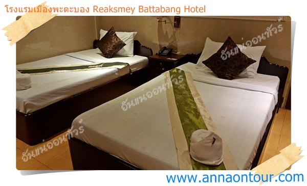 เตียงนอนห้องพักในโรงแรมเมืองพะตะบอง