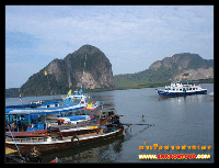 เรือนำเที่ยวที่ท่าเรือหาดปากเม็ง